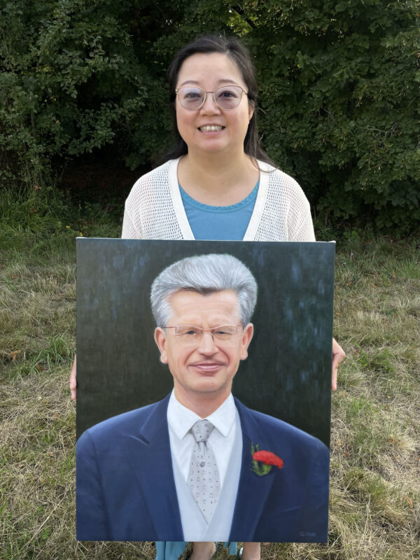 Qi holding Xavier oil portrait 20x24